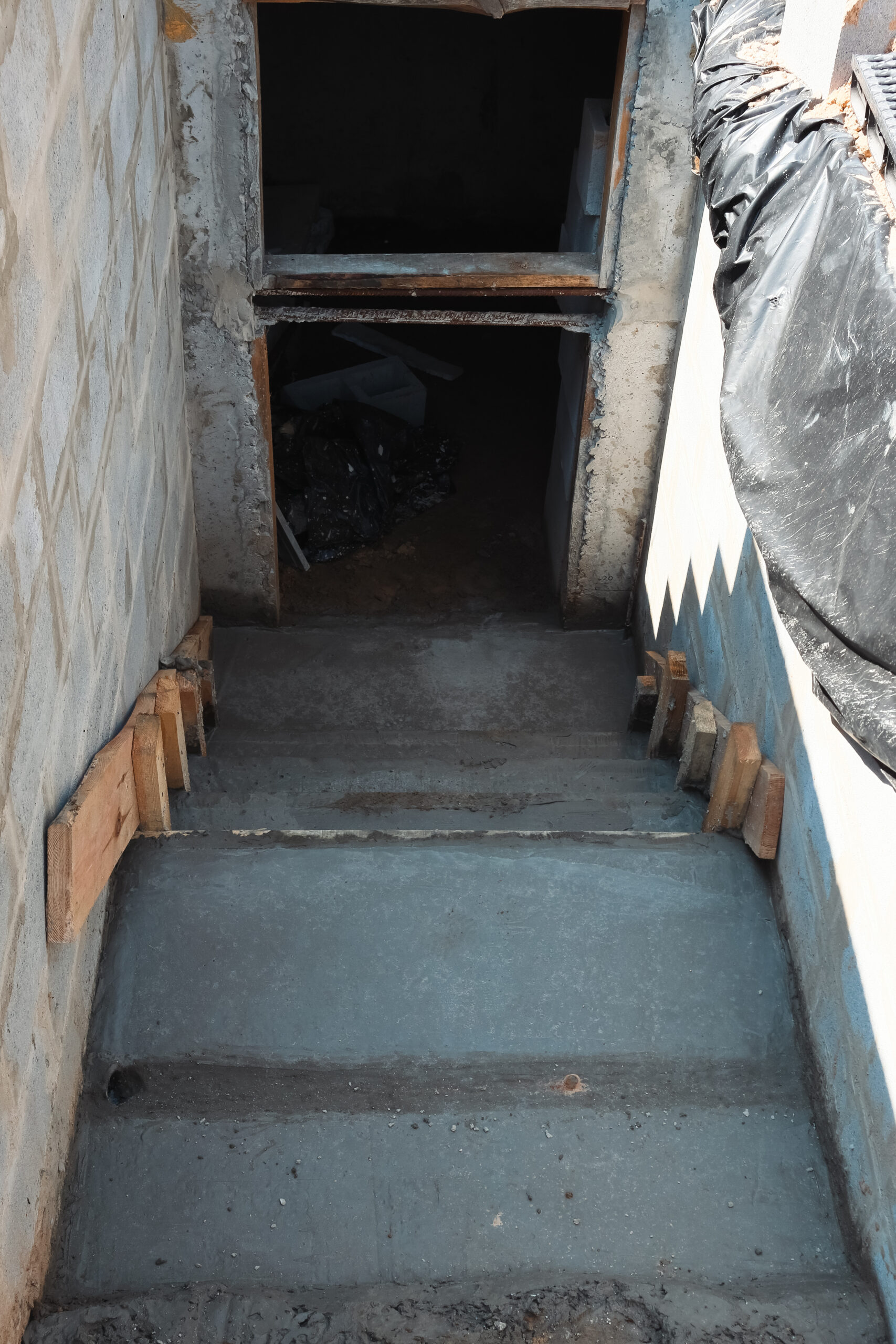 building-concrete-staircase-basement-concrete-staircase-stairwell-construction-scaled.jpg